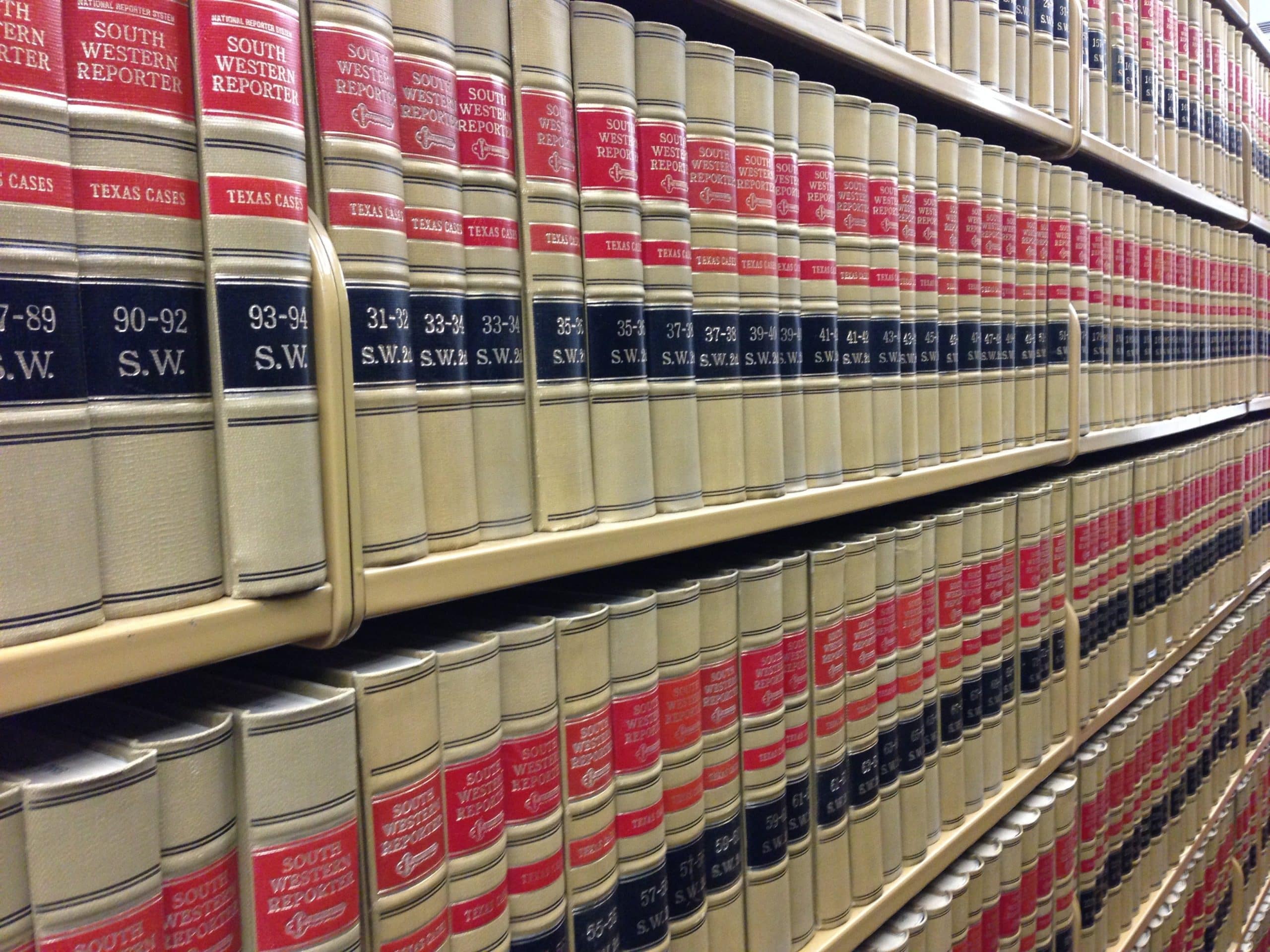 Shelves of legal reporter volumes in a law library