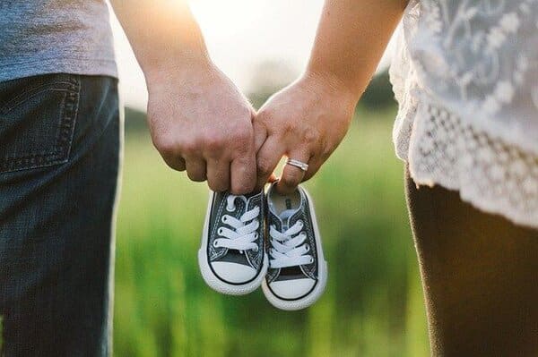 Family Law Attorney and Legal Representation Family Holding Child's Shoes
